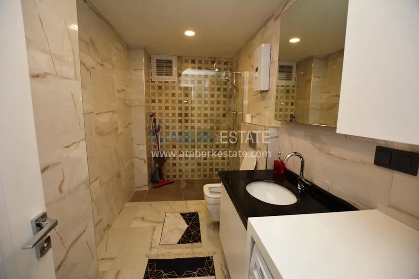 Purchase 2+1 apartment with furniture and partial sea view in Mahmutlar — sale from owner 12