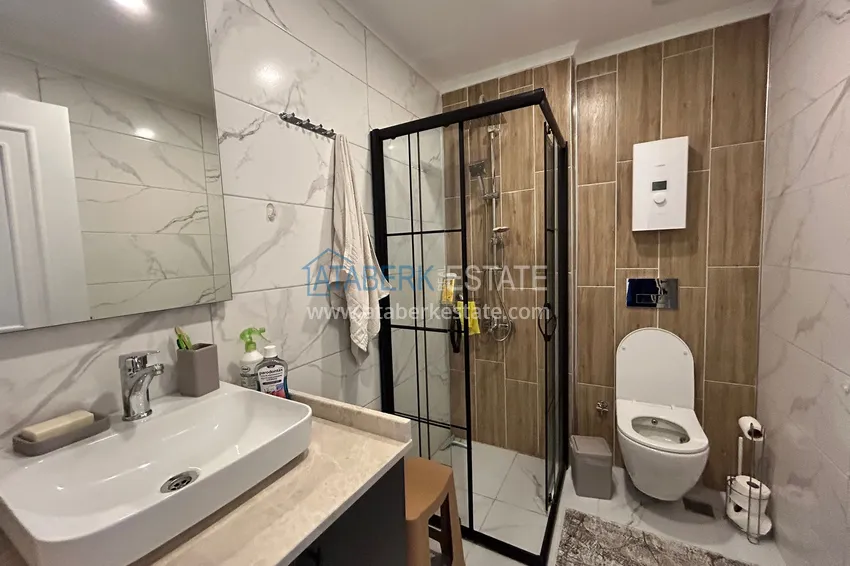 Purchase  2+1 penthouse duplex with sea and mountain views in the center of Alanya 14 