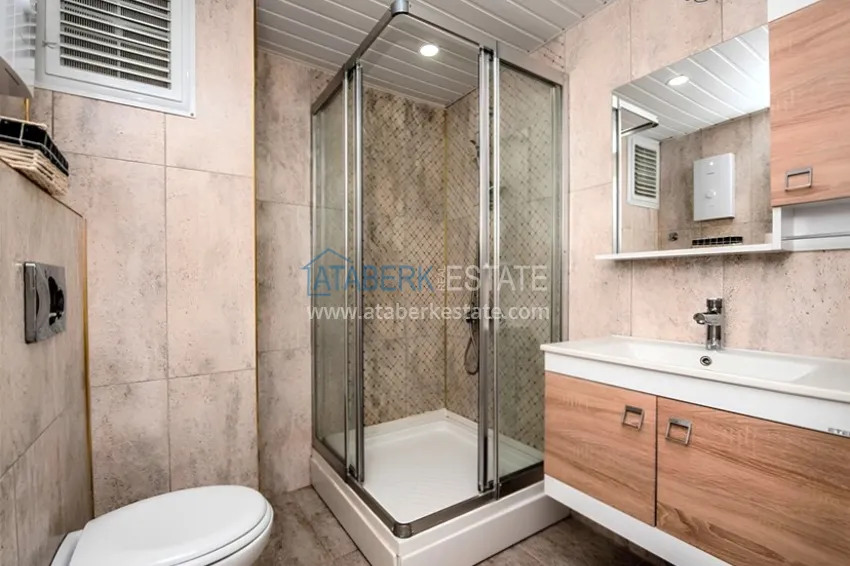 Purchase Two-level penthouse 2+1 with furniture and sea views in the center of Mahmutlar 13 