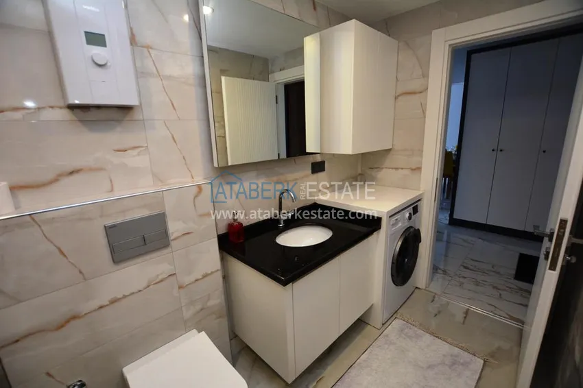 Purchase 2+1 apartment with furniture and partial sea view in Mahmutlar — sale from owner 15