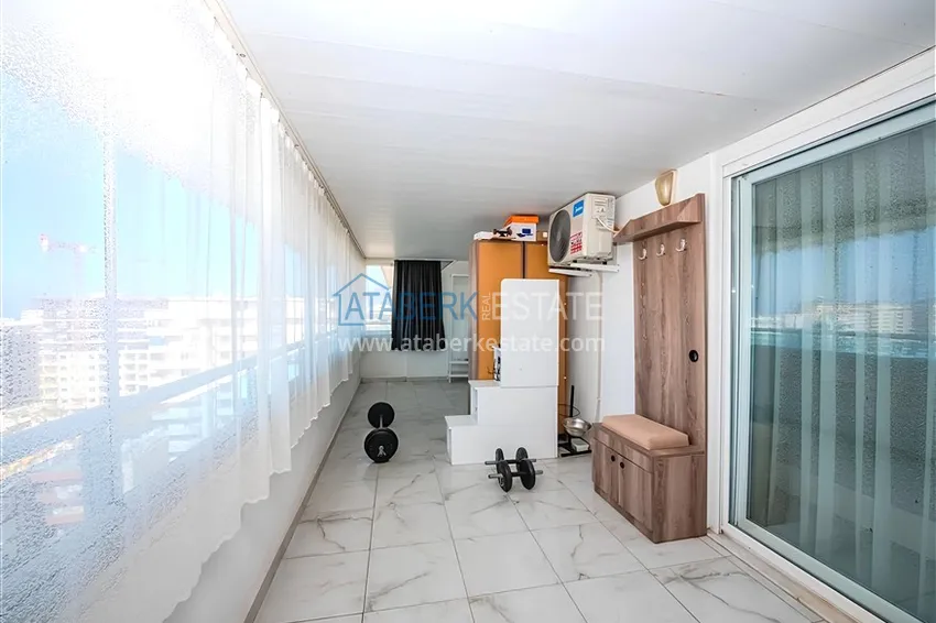 Purchase Two-level penthouse 2+1 with furniture and sea views in the center of Mahmutlar 17 