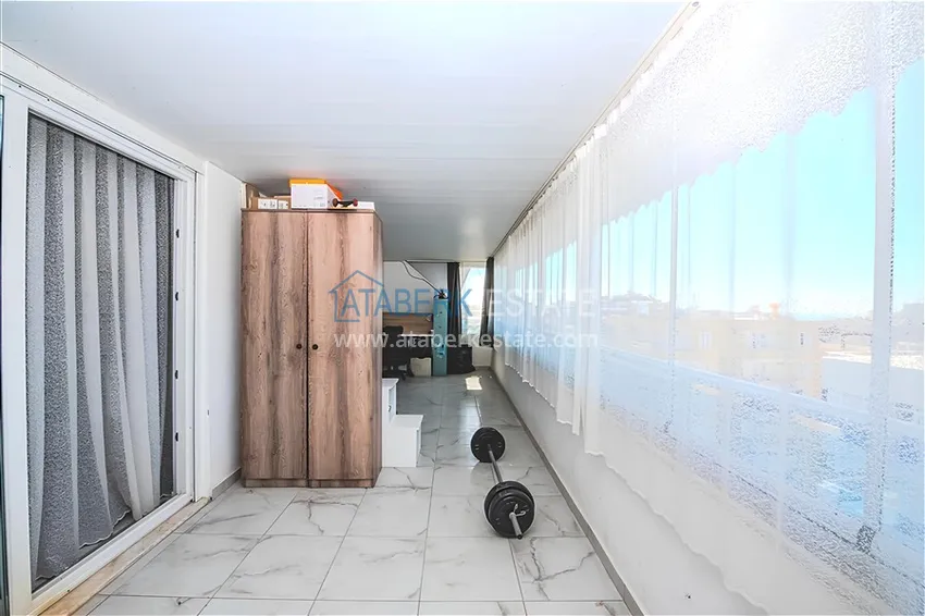 Purchase Two-level penthouse 2+1 with furniture and sea views in the center of Mahmutlar 18 