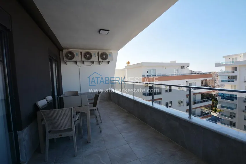 Purchase 2+1 apartment with furniture and partial sea view in Mahmutlar — sale from owner 18