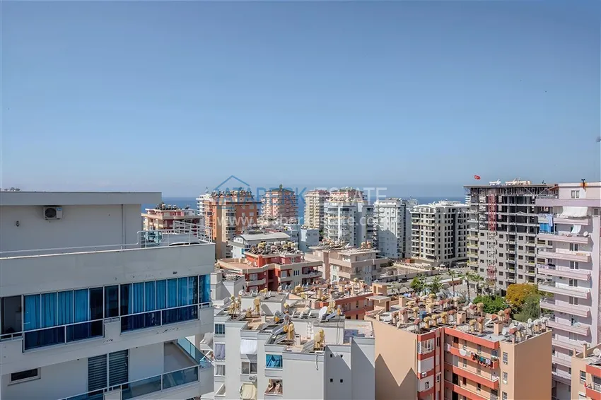 Purchase Two-level penthouse 2+1 with furniture and sea views in the center of Mahmutlar 19 
