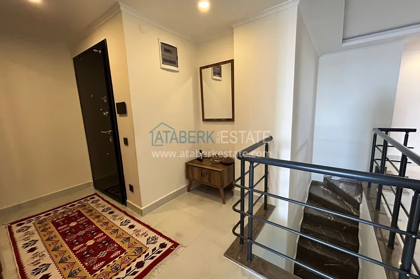 Purchase  2+1 penthouse duplex with sea and mountain views in the center of Alanya 1 