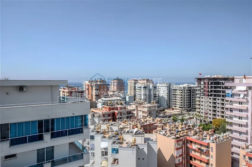 Purchase Two-level penthouse 2+1 with furniture and sea views in the center of Mahmutlar 20 