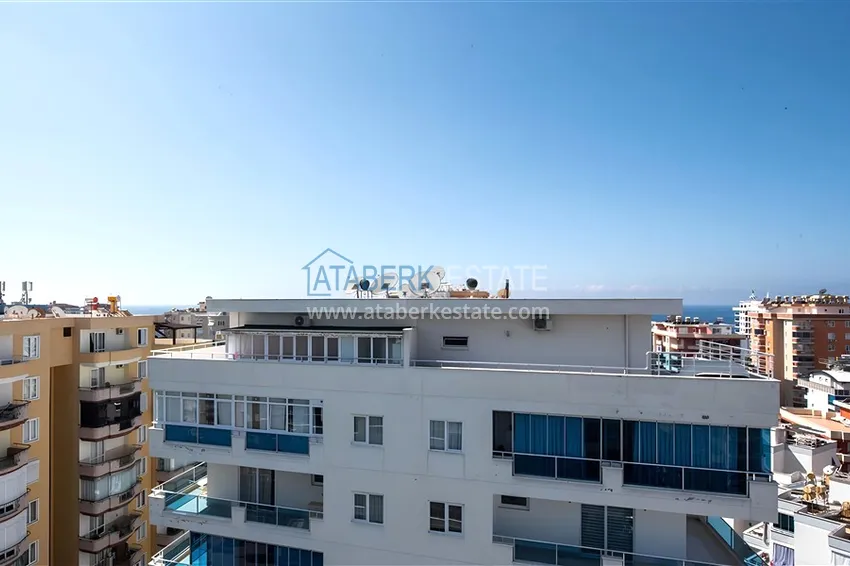 Purchase Two-level penthouse 2+1 with furniture and sea views in the center of Mahmutlar 21 