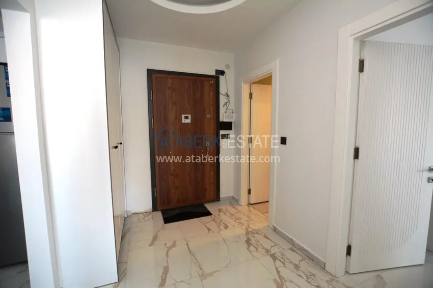 Purchase 2+1 apartment with furniture and partial sea view in Mahmutlar — sale from owner 2