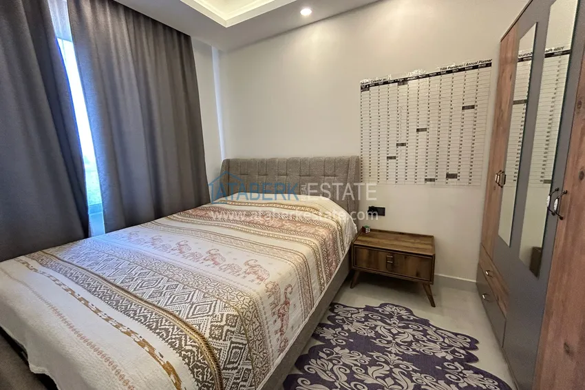 Purchase  2+1 penthouse duplex with sea and mountain views in the center of Alanya 11 