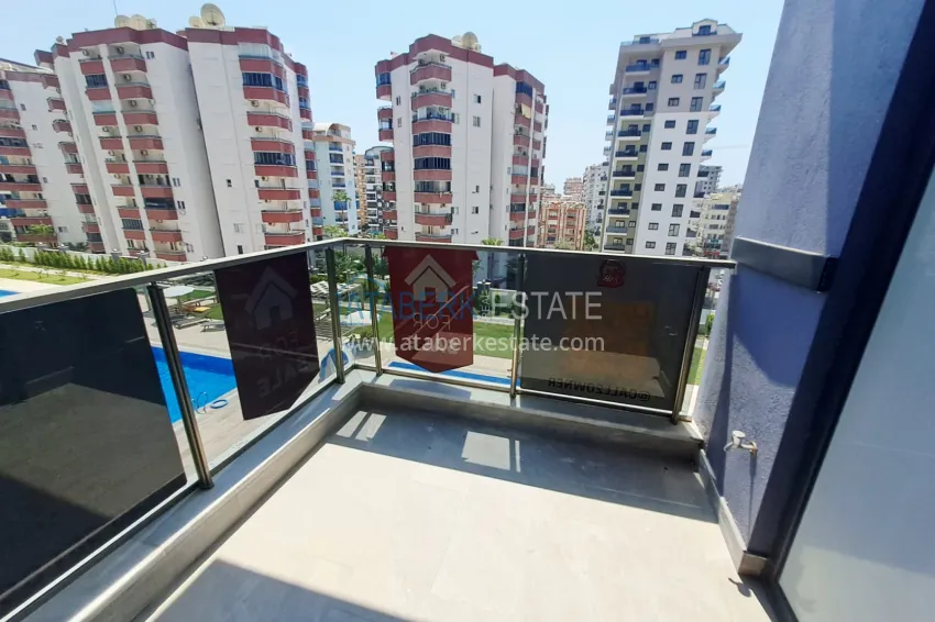 Purchase 1+1 apartment, 50 m² in Mahmutlar - partially furnished, from owner 12