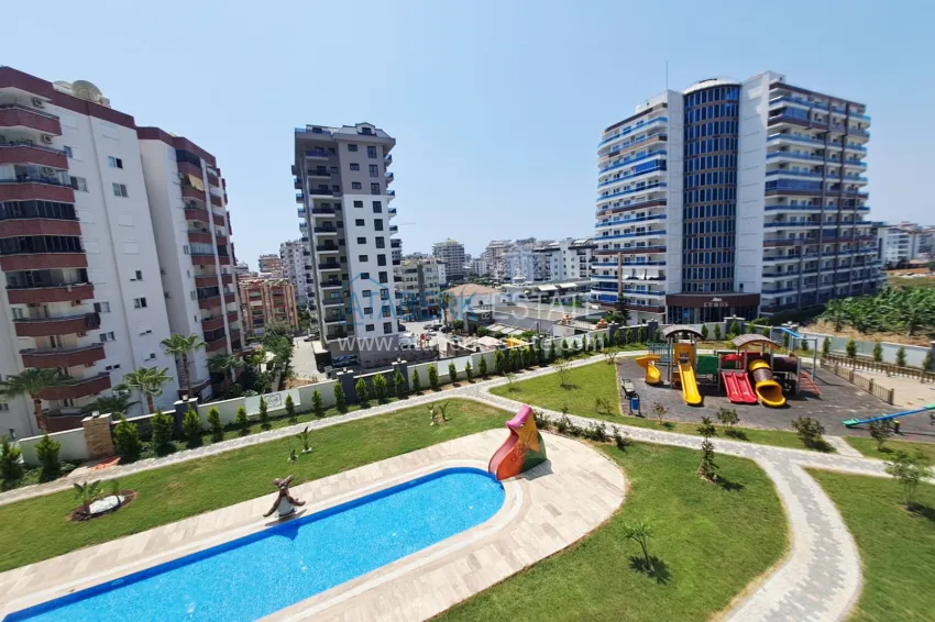 Purchase 1+1 apartment, 50 m² in Mahmutlar - partially furnished, from owner 13