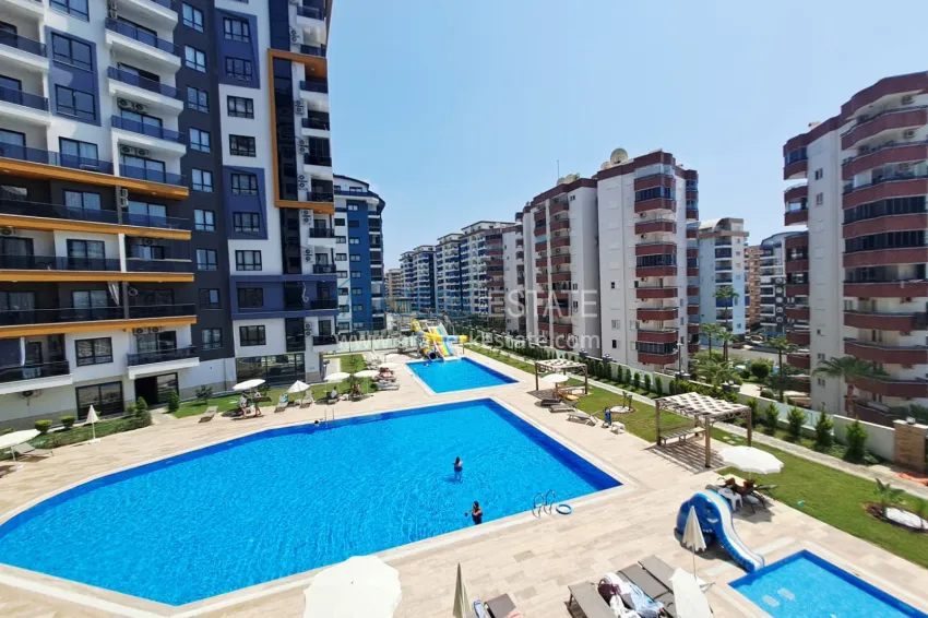 Purchase 1+1 apartment, 50 m² in Mahmutlar - partially furnished, from owner 14