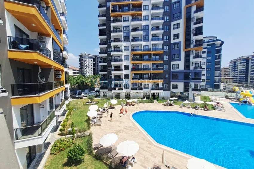 Purchase 1+1 apartment, 50 m² in Mahmutlar - partially furnished, from owner 15