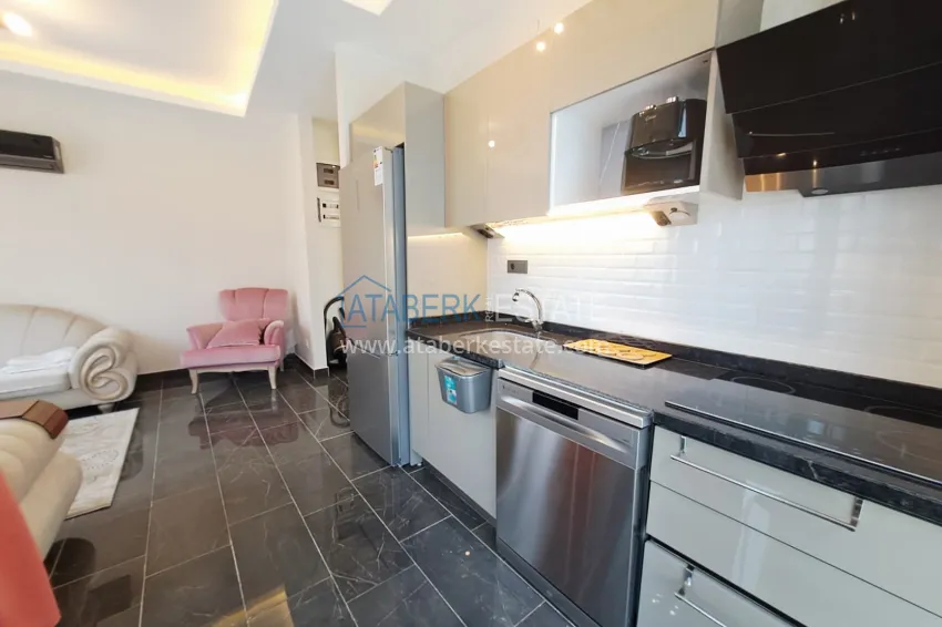 Purchase 1+1 apartment, 50 m² in Mahmutlar - partially furnished, from owner 4