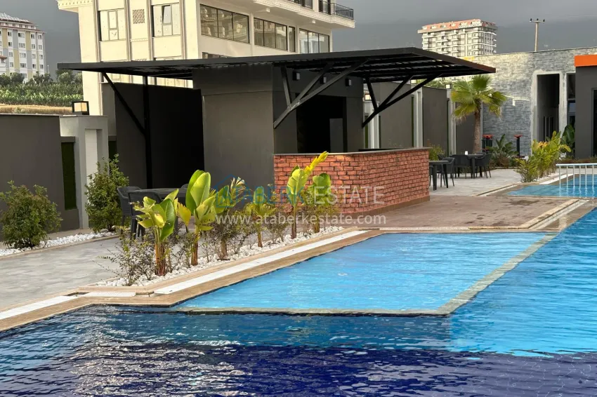 2+1 apartment with furniture, glazed balcony and sea view in the center of Mahmutlar, Alanya 3 