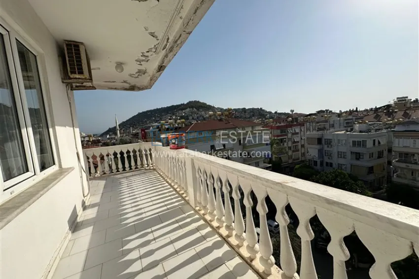 Purchase 2+1 apartment with a residence permit in the center of Alanya — furniture, view of the fortress 13 