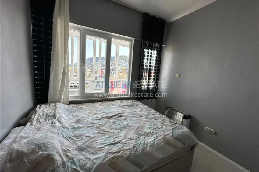 Purchase 2+1 apartment with a residence permit in the center of Alanya — furniture, view of the fortress 19 