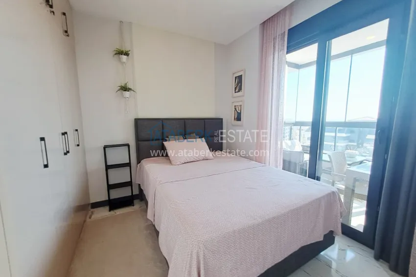 Purchase 2+1 apartment with furniture, glazed balcony and sea view in the center of Mahmutlar, Alanya 9 