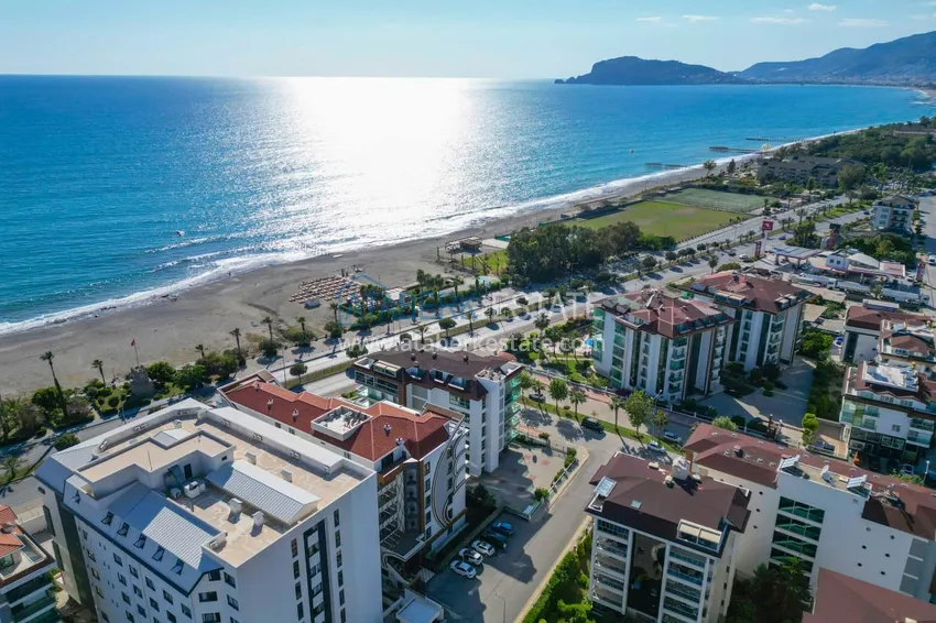 1+1 apartment with private garden in an elite complex on the beachfront — Alanya, Kestel district 4 