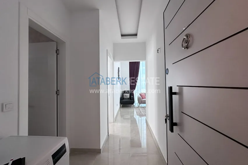 Purchase 1+1 apartment in Mahmutlar, Alanya — new furniture and convenient location 1 