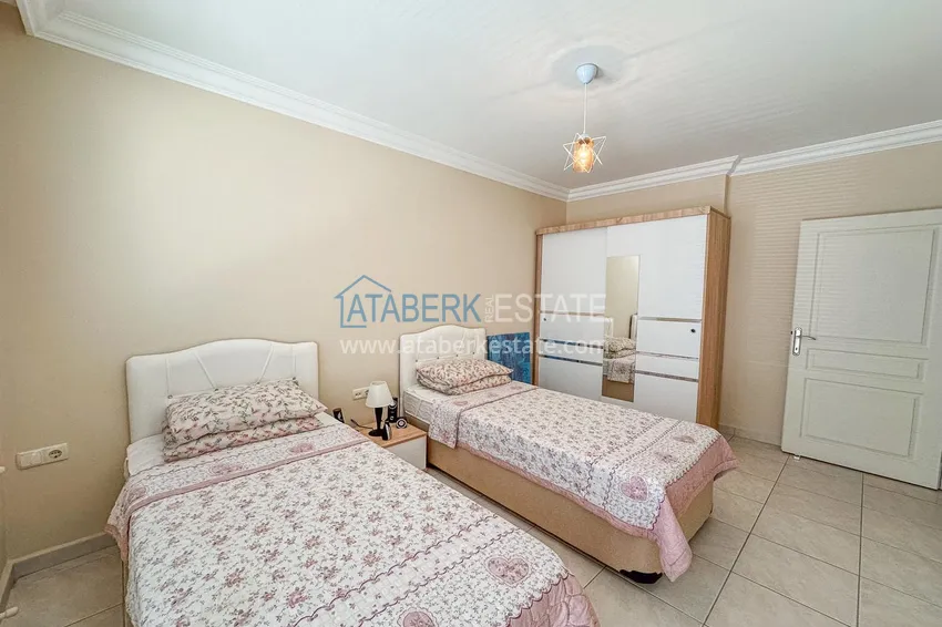 Purchase  Furnished 2+1 apartment in Alanya, Tosmur district - suitable for a residence permit, 150 meters from the sea  10 