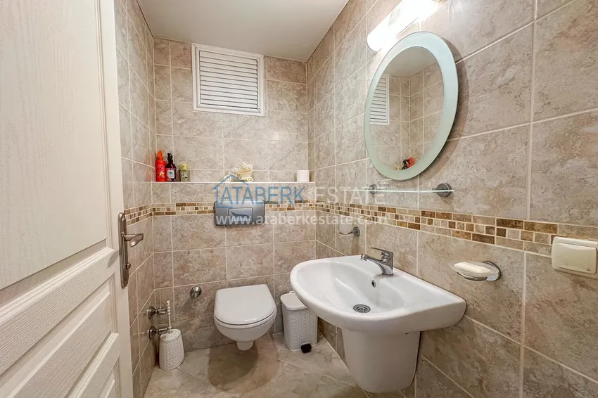 Purchase  Furnished 2+1 apartment in Alanya, Tosmur district - suitable for a residence permit, 150 meters from the sea  12 