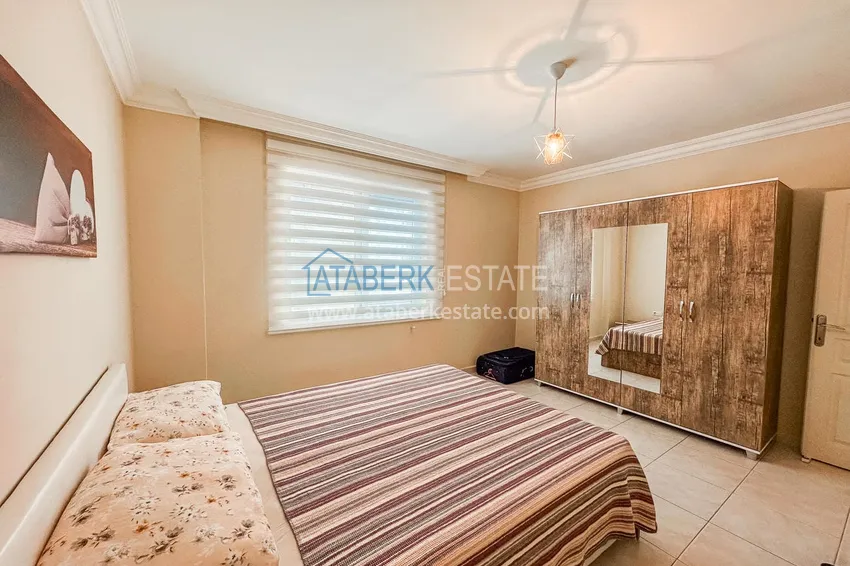 Purchase  Furnished 2+1 apartment in Alanya, Tosmur district - suitable for a residence permit, 150 meters from the sea  8 