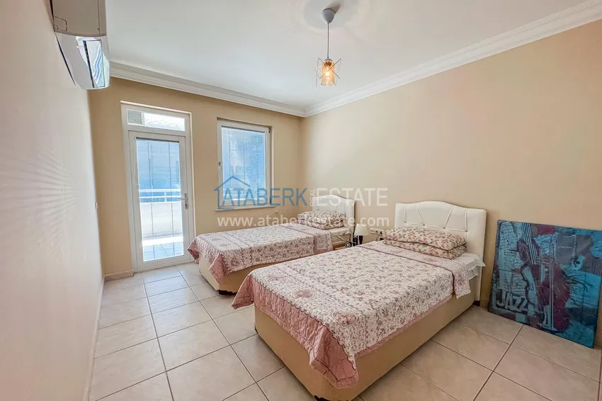 Purchase  Furnished 2+1 apartment in Alanya, Tosmur district - suitable for a residence permit, 150 meters from the sea  9 