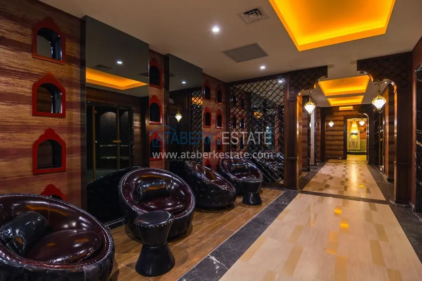 Luxury real estate on the first line in Alanya: stylish apartment, VIP-level complex, Oba district 18 