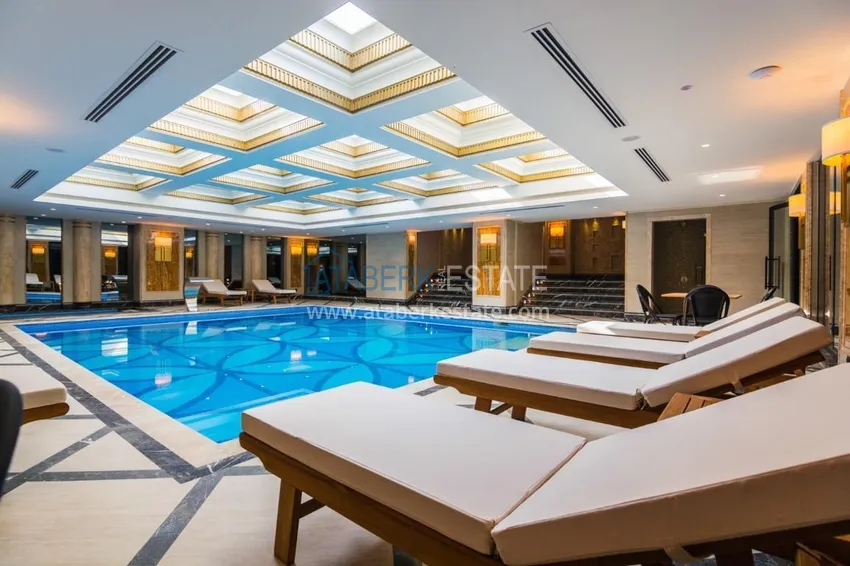 Luxury real estate on the first line in Alanya: stylish apartment, VIP-level complex, Oba district 23 