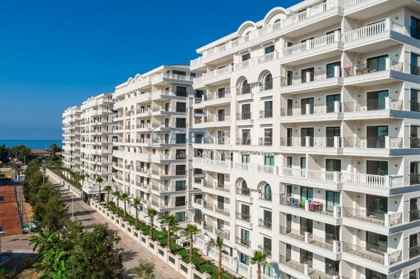 Luxury real estate on the first line in Alanya: stylish apartment, VIP-level complex, Oba district 2 