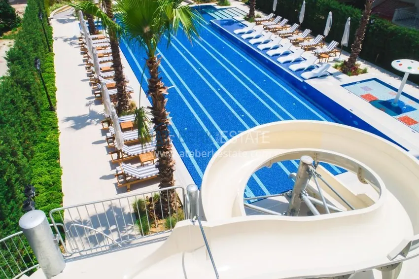 Luxury real estate on the first line in Alanya: stylish apartment, VIP-level complex, Oba district 8 