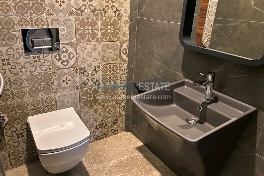 Apartment 2+1 on the beachfront in Mahmutlar — a ready-made version with a sea view 24 