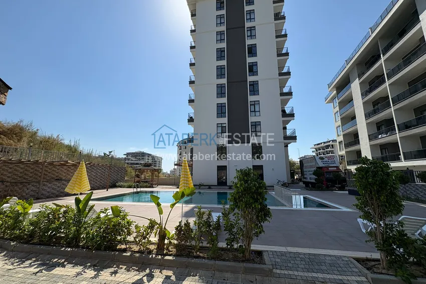 New 1+1 apartment in Mahmutlar, Alanya — new building with mountain views 1 