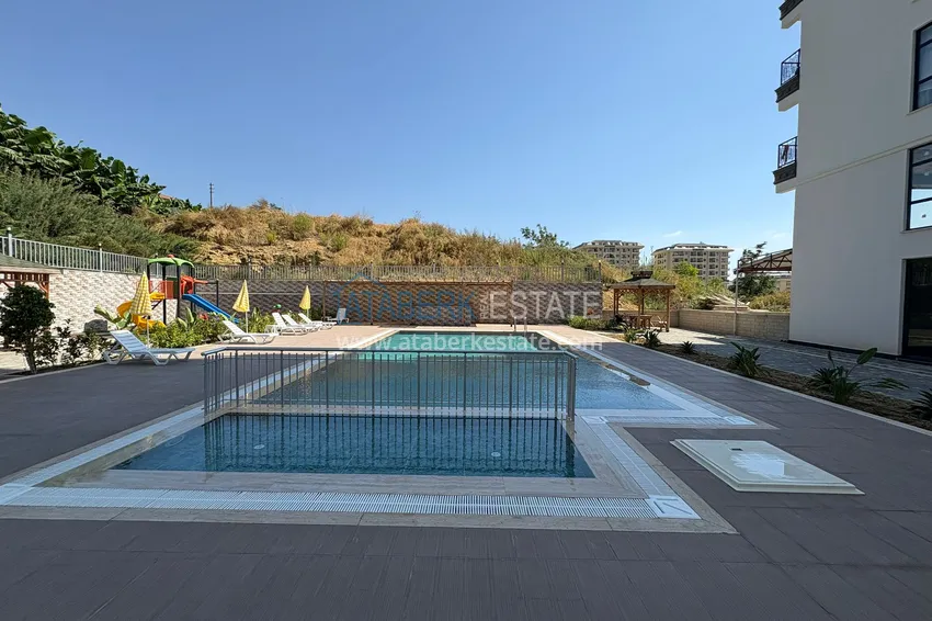 New 1+1 apartment in Mahmutlar, Alanya — new building with mountain views 3 