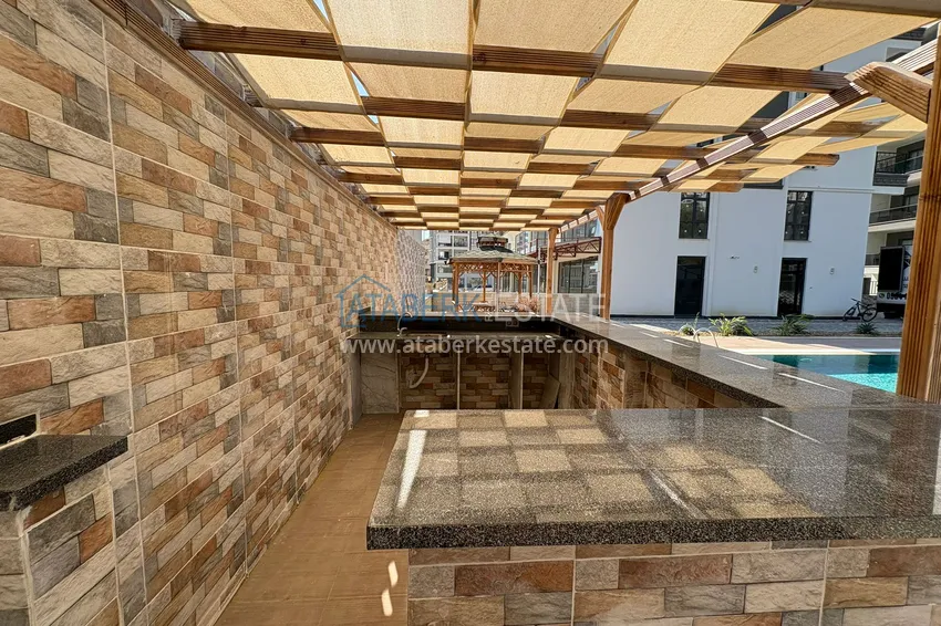 New 1+1 apartment in Mahmutlar, Alanya — new building with mountain views 9 