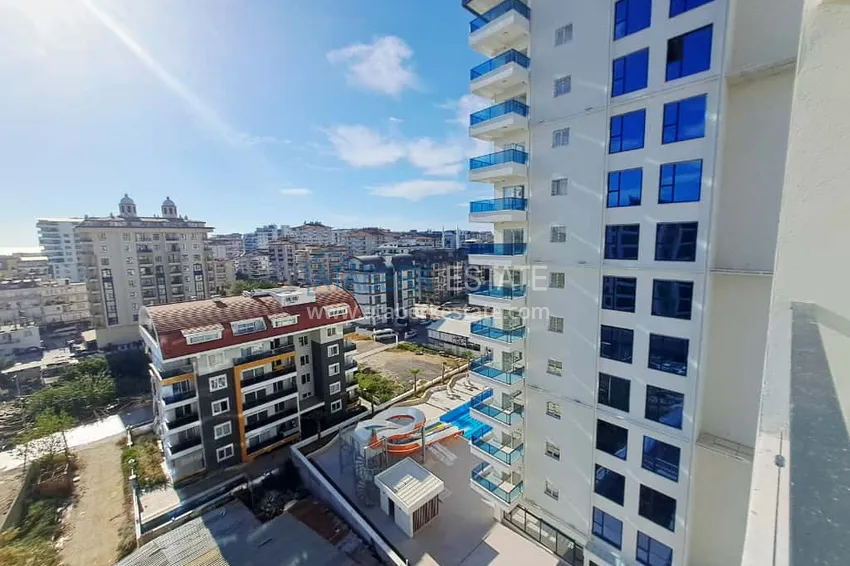 Purchase  1+1 apartment with sea view in Mahmutlar — new, from the owner 15 