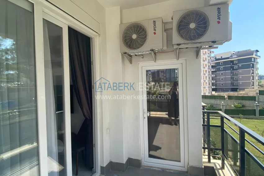 Purchase 1+1 furnished apartment in Alanya, Avsallar district with short-term rental permit 12 