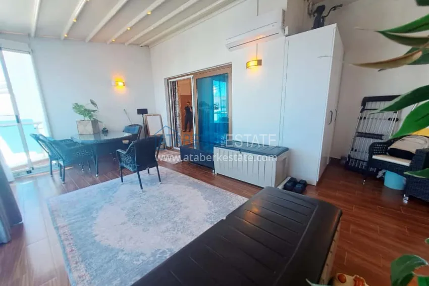 Purchase 2+1 penthouse duplex in Mahmutlar — with sea views and designer renovation 26