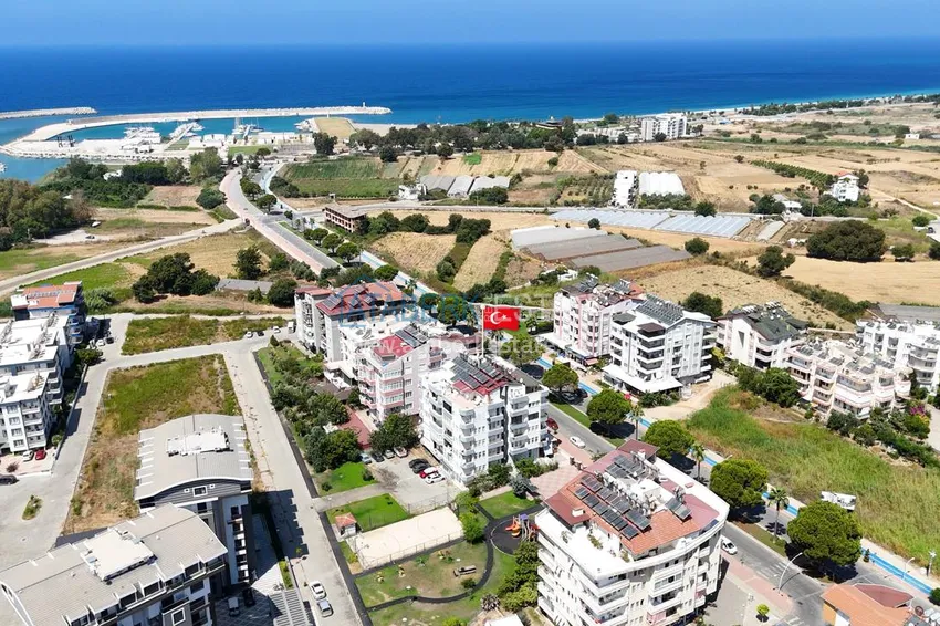 City apartment with a glazed balcony after renovation in Gazipasa 1 