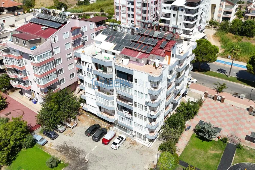 City apartment with a glazed balcony after renovation in Gazipasa 4 