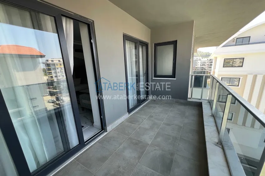 Purchase 1+1 apartment in Alanya, Kargicak, the second coastal one. Suitable for short term rentals 42