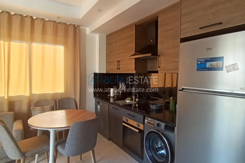 Purchase 1+1 apartment in Alanya Oba - well-maintained complex, pool view 2