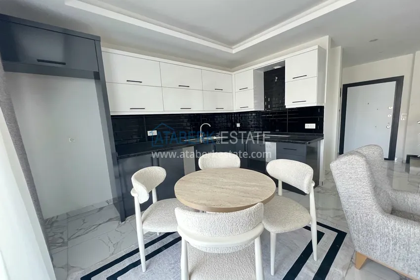 Purchase 1+1 apartment in Alanya, Kargicak, the second coastal one. Suitable for short term rentals 34