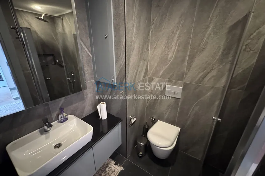 Purchase 1+1 apartment in the center of Alanya - furnished in a luxury complex 13