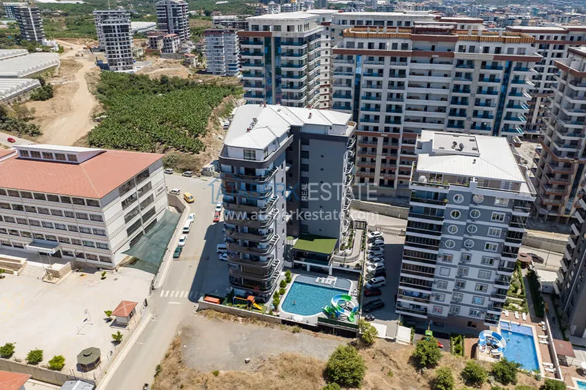 Apartment 1+1 in the center of Mahmutlar — modern comfort and panoramic views 1