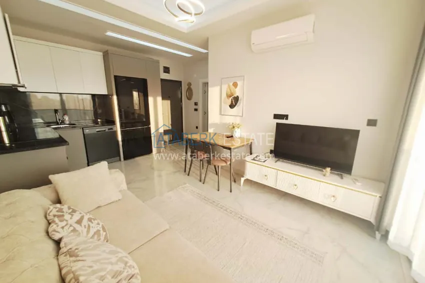Purchase 1+1 apartment in Alanya, Oba district with furniture and mountain views — installments up to 6 months 1