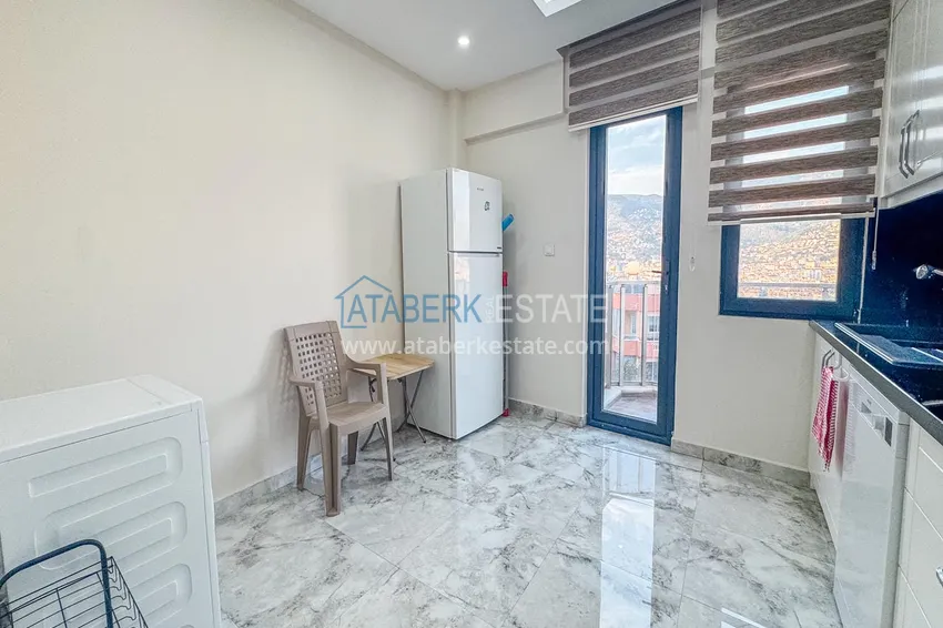 Purchase  3+1 apartment for a residence permit in Alanya, Kale district - furnished and with panoramic views of the sea and port  12 