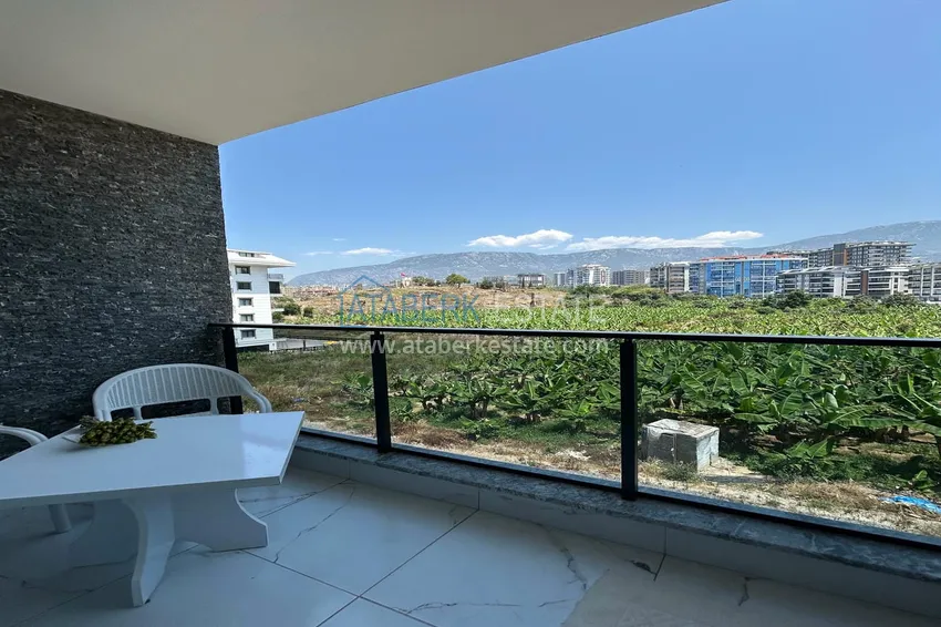 Purchase  1+1 apartment with furniture and mountain views - Mahmutlar, a cozy boutique complex 14 