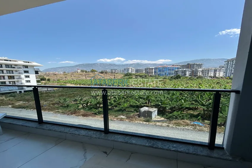 Purchase  1+1 apartment with furniture and mountain views - Mahmutlar, a cozy boutique complex 15 